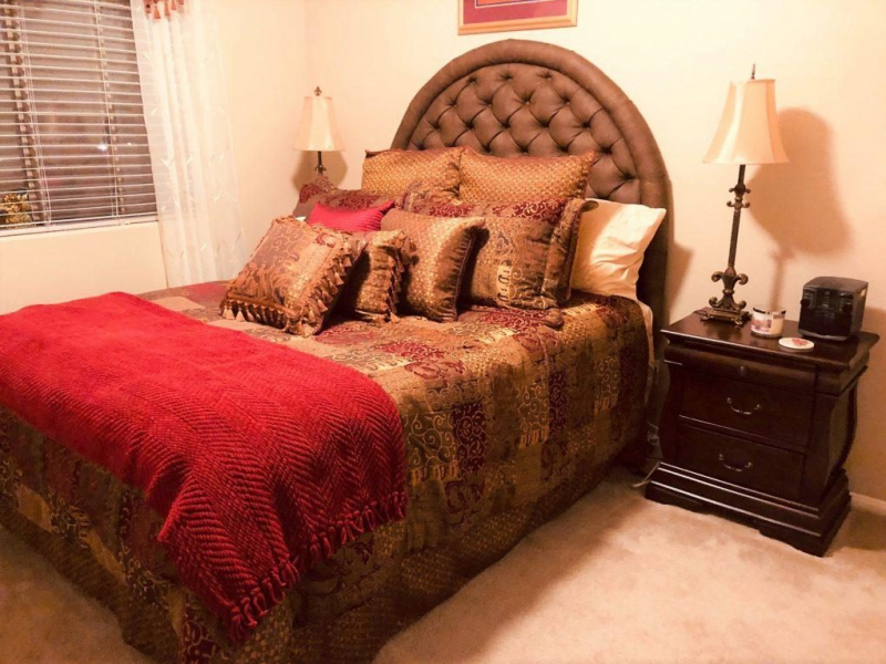 Queen bed w/ custom headboard & two bedside tables 